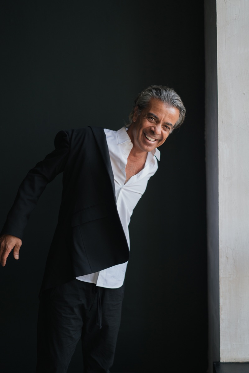 Walid Arfush — studio portrait in a suit